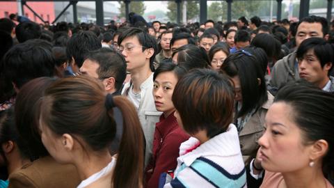 China population shrinks for first time in over six decades, economy slows