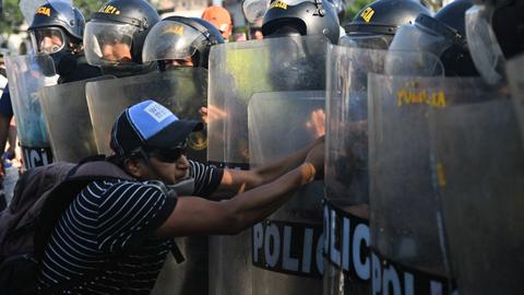 Peru police fire tear gas to disperse anti-government protesters