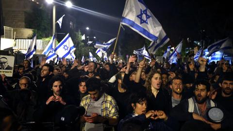 Thousands hit Israel's streets after Netanyahu fires defence chief