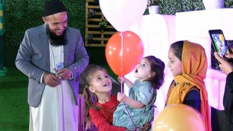 Afghan toddler who became orphan during US pullout reunited with family