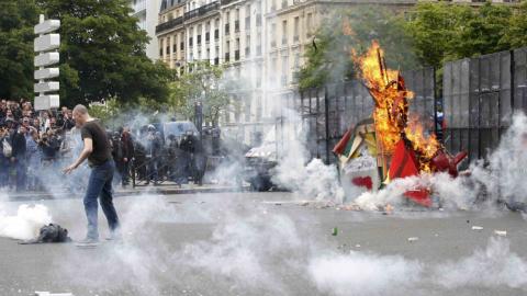 Why are labour unions in France protesting?