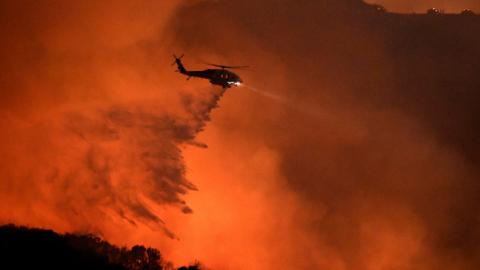 California wildfires force thousands to evacuate