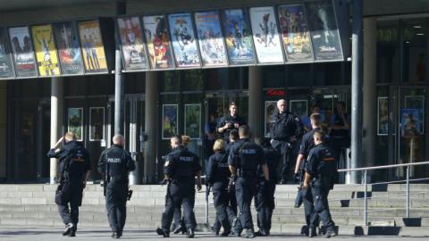 Gunman takes hostages in German cinema, shot dead by police