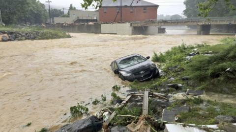 West Virginia floods kill 26