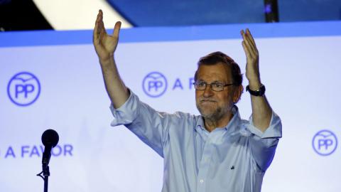 Spain's Rajoy to form new govt as polls bring no majority