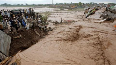 Pakistani rescuers search for 23 people buried under mud