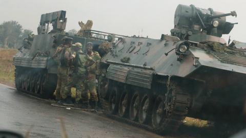 Armoured vehicles roll into Zimbabwe's capital