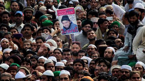 Why does a Pakistani assassin inspire anti-government demonstrators?