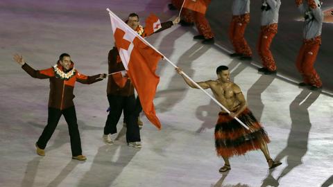 Shirtless Tongan's goal: Don't hit tree, finish and inspire