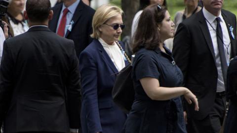 Clinton, diagnosed with pneumonia, scraps California trip