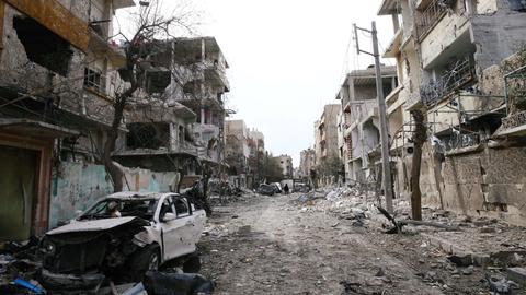 Humanitarian 'pause' takes effect in Syria enclave