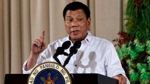 Philippines' Duterte warns against co-operation in drug war probe