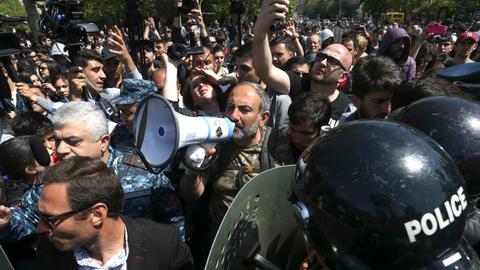 Armenian PM walks out of talks with protest leader