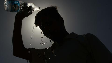 In photos: no sign of relief from heatwave across India