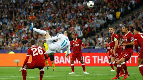 Super Bale sinks Liverpool as Madrid make it three in a row