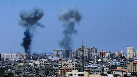 Tensions flare as Israel hits dozens of Gaza targets after mortar barrage