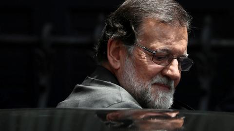 Ex-Spain PM Rajoy steps down as party leader