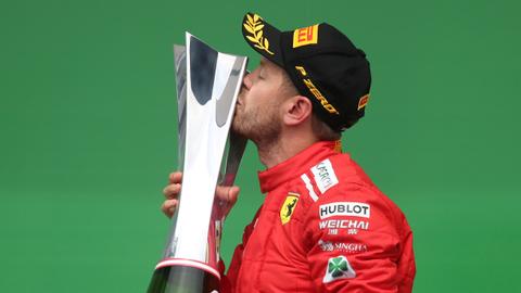 Vettel takes 50th win and F1 championship lead in Canada