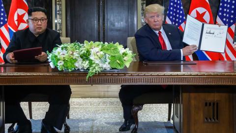 Kim, Trump sign agreement at summit