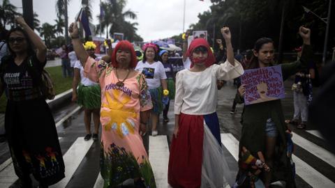 Philippine women marchers tell Duterte ‘enough’