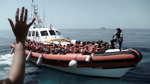Boat migrants rocked by EU political storm arrive in Spain