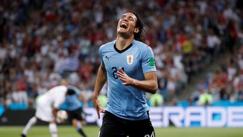 Cavani fires Uruguay into last eight as Ronaldo dream ends