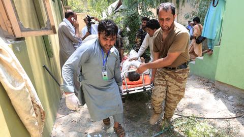 Casualties rise in Afghan city as UK plans troop deployment