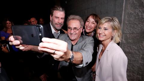 Travolta, Newton-John reunite for 40th anniversary celebration of 'Grease'