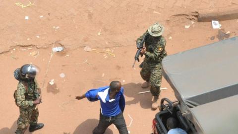 Bullets and tear gas used in Kampala as police and army disperse protesters