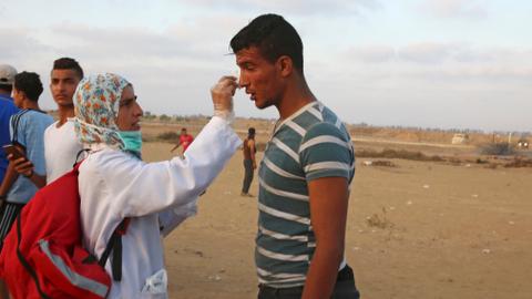 At Gaza protests, medical workers face great danger
