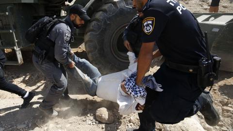 Israel shuts roads to Bedouin village facing demolition, activist arrested