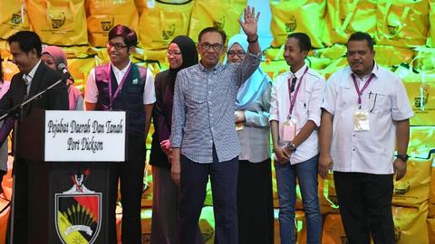 Malaysia’s Anwar returns to frontline politics in big poll win