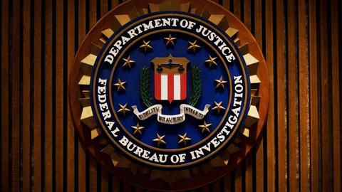 Former FBI agent gets 4 years in prison for leaking documents