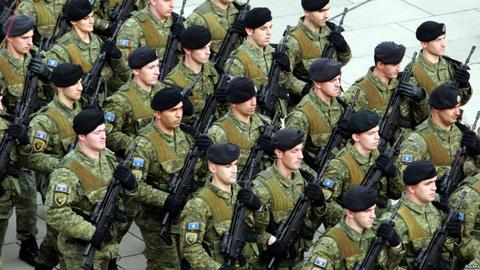Serbia warns of consequences as Kosovo moves to create an army