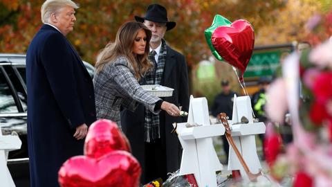 Trump family pays tribute at Pittsburgh synagogue, protesters cry foul