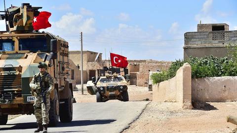 Turkish, US troops begin joint patrols in Syria's Manbij