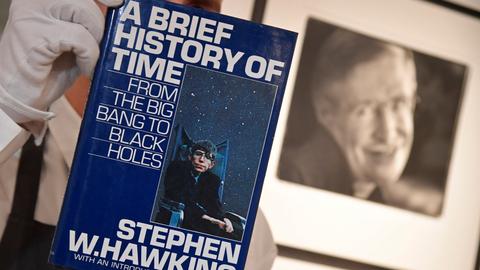 Stephen Hawking's thesis and wheelchair sell for $1 million