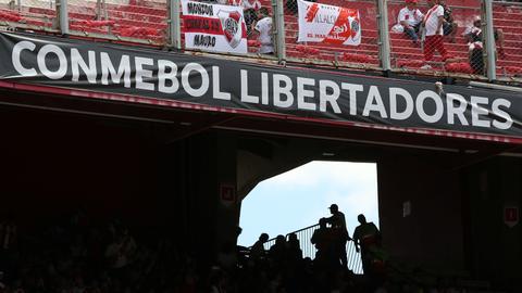 Copa Libertadores final postponed after Boca bus attacked in Buenos Aires