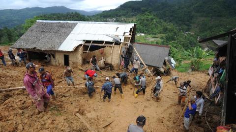 At least nine killed as rain sets off Indonesia landslide