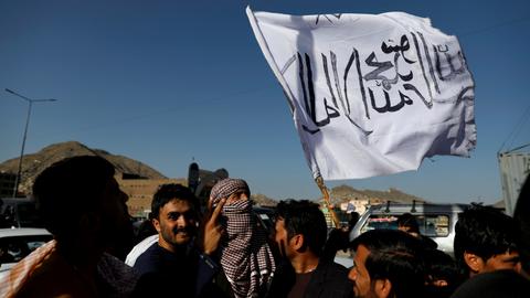 Taliban bring top leader into talks with US