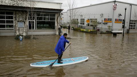 Floods isolate two northern California towns