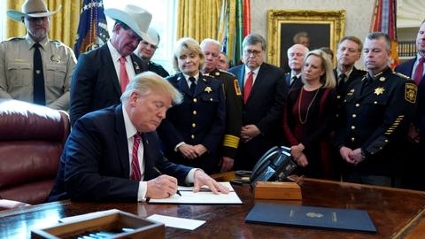 Trump signs first veto to secure funding for border wall