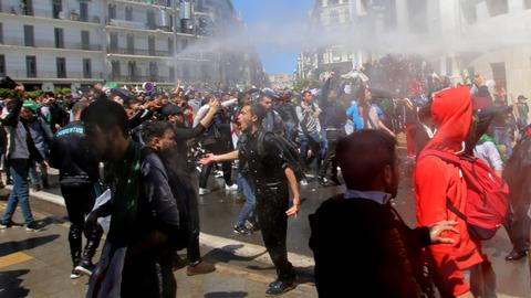 Thousands of protesters reject Algerian interim president