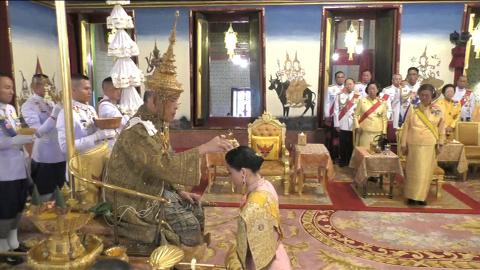 Thai king is officially crowned, boosting his regal power