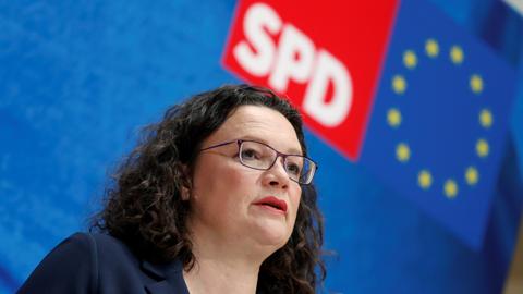 German SPD leader quits in blow to Merkel's loveless coalition