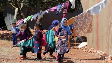 Displaced Syrians struggle to celebrate Eid amid violence