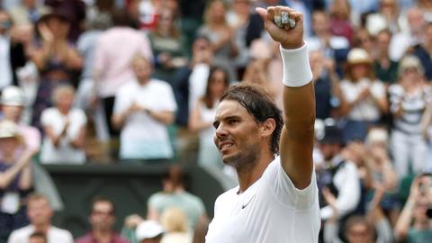 Nadal bursts Sousa's bubble to reach Wimbledon quarters