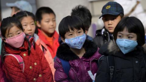 China launches polution prob after hundreds of students fall ill