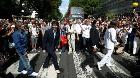 Fans recreate Beatles' Abbey Road cover shot 50 years on