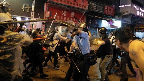 Police defend warning shot as Hong Kong divide widens